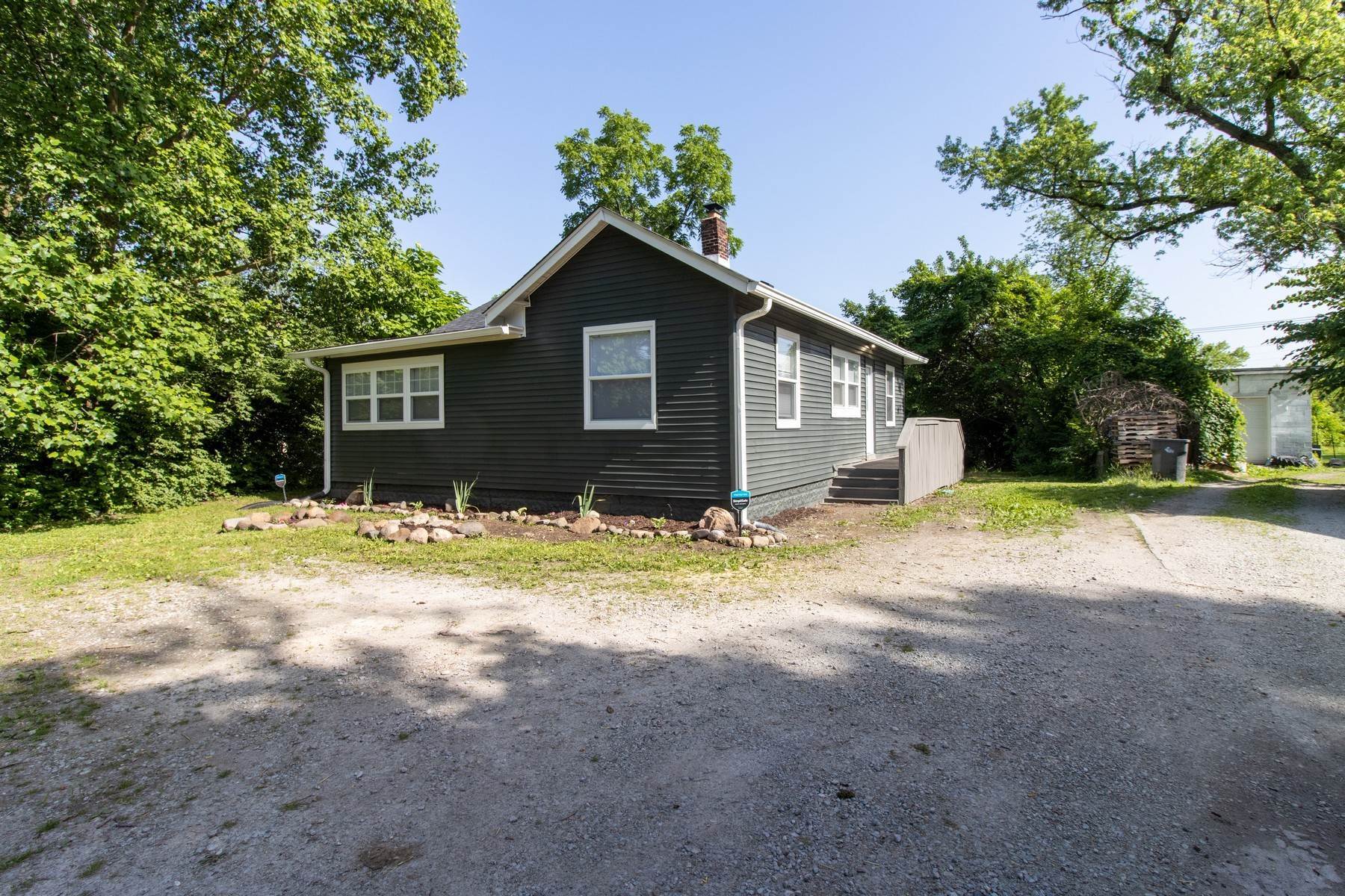 Single Family Homes for Sale at Renovated Ranch on Trend 5610 E 21st Street Indianapolis, Indiana 46218 United States